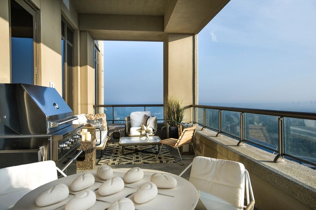 A private terrace with outdoor seating and a view